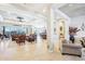 Expansive living area with tile flooring, large windows, and views to the backyard at 31626 N 129Th Dr, Peoria, AZ 85383