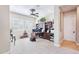 Spacious office with custom built-ins, a ceiling fan, and plantation shutters for ample natural light at 31626 N 129Th Dr, Peoria, AZ 85383