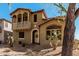 Inviting two-story home boasts a balcony and low-maintenance desert landscaping at 32405 N 23Rd Ave, Phoenix, AZ 85085