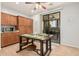 Kitchen featuring wood cabinets, stainless steel appliances, and an outdoor patio view at 32405 N 23Rd Ave, Phoenix, AZ 85085