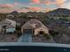 Aerial view of the home with a desert landscape and stunning mountain views at 3318 W Ravina Ln, Anthem, AZ 85086