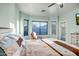 Inviting main bedroom retreat featuring natural lighting, bay window and relaxing chair at 3318 W Ravina Ln, Anthem, AZ 85086