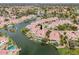 An aerial image showing an exclusive waterfront community with luxurious homes, pools, and private docks at 3370 S Ivy Way, Chandler, AZ 85248