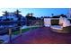 A relaxing backyard patio on a waterfront property, great for entertaining and enjoying the outdoors at 3370 S Ivy Way, Chandler, AZ 85248