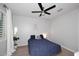 Bright bedroom with a ceiling fan, natural light, and a comfortable atmosphere at 3370 S Ivy Way, Chandler, AZ 85248