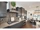 Gourmet kitchen with stainless steel appliances, stone countertops, and stylish fixtures for cooking and entertaining at 3370 S Ivy Way, Chandler, AZ 85248