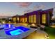 This backyard is a dream, featuring a pool, jacuzzi and a fire pit, perfect for entertaining at 3654 E San Pedro Pl, Chandler, AZ 85249