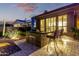 A covered patio with built-in BBQ station, complete with counter seating, ideal for outdoor gatherings and relaxation at 3654 E San Pedro Pl, Chandler, AZ 85249