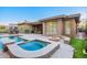 Lush backyard with pool, spa, fire pit, patio, and beautifully landscaped surroundings at 3654 E San Pedro Pl, Chandler, AZ 85249