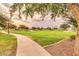 Scenic community park with walking paths, green spaces, and mature trees, ideal for outdoor activities and relaxation at 3654 E San Pedro Pl, Chandler, AZ 85249