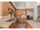 Kitchen featuring stainless appliances, granite counters, tile backsplash, and ample cabinet space at 3654 E San Pedro Pl, Chandler, AZ 85249