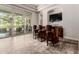 Spacious living room area with a full bar and outdoor access, perfect for entertaining guests at 3654 E San Pedro Pl, Chandler, AZ 85249