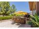 Outdoor grill and bar area with seating, perfect for entertaining at 3654 E San Pedro Pl, Chandler, AZ 85249