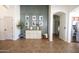 Hallway features tiled flooring, and seamless transition to other rooms at 41250 W Thornberry Ln, Maricopa, AZ 85138