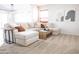 Cozy living room featuring a sectional sofa, a coffee table, and a side table on carpet at 41250 W Thornberry Ln, Maricopa, AZ 85138