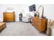 Well-decorated bedroom with natural light, comfortable chair, and stylish furniture at 41250 W Thornberry Ln, Maricopa, AZ 85138