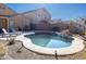 Backyard oasis featuring a private pool, lounge chairs, and a tranquil setting for outdoor enjoyment at 41250 W Thornberry Ln, Maricopa, AZ 85138