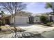 A well-kept home featuring desert landscaping, a two-car garage, and inviting curb appeal at 43857 W Askew Dr, Maricopa, AZ 85138