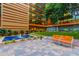 Inviting courtyard with a water feature, seating, and pathways surrounded by greenery at 4808 N 24Th St # 1402, Phoenix, AZ 85016
