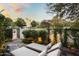 Lush backyard with lounge chairs and landscaped garden, perfect for relaxation at 5101 N Casa Blanca Dr # 25, Paradise Valley, AZ 85253