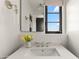 Bright bathroom featuring a modern sink, stylish fixtures, and a window with a view at 5101 N Casa Blanca Dr # 25, Paradise Valley, AZ 85253