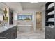 Luxurious bathroom featuring freestanding tub, sleek shower, modern fixtures, and large window with outdoor views at 5101 N Casa Blanca Dr # 25, Paradise Valley, AZ 85253