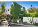 Beautiful two story home with an eye-catching wall of climbing ivy and lush, verdant landscaping at 5101 N Casa Blanca Dr # 25, Paradise Valley, AZ 85253