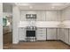 Well-lit kitchen with stainless steel appliances and a large center island at 5101 N Casa Blanca Dr # 25, Paradise Valley, AZ 85253
