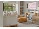 Bright living room featuring neutral tones, a large window, and decorative accents at 5101 N Casa Blanca Dr # 25, Paradise Valley, AZ 85253