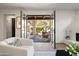 Living room with an open patio that leads to an outdoor seating area at 5101 N Casa Blanca Dr # 25, Paradise Valley, AZ 85253