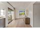 Spacious living room featuring hardwood floors, a large windows, and modern decor throughout at 5101 N Casa Blanca Dr # 25, Paradise Valley, AZ 85253