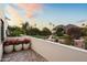 Outdoor terrace features beautiful red flowers and a lush garden with beautiful mountain views at 5101 N Casa Blanca Dr # 25, Paradise Valley, AZ 85253