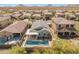 Aerial view of neighborhood with pool and backyard patio at 538 E Pasaro Dr, Phoenix, AZ 85085