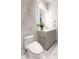 Bathroom complete with luxurious bidet toilet, modern vanity, and marble walls at 6587 N Palmeraie Blvd # 2041, Paradise Valley, AZ 85253