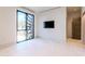 Bright bedroom offers a great view, wall-mounted TV, and modern finishes throughout at 6587 N Palmeraie Blvd # 2041, Paradise Valley, AZ 85253