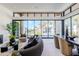 Bright living room with large windows offering scenic views and comfortable seating at 6587 N Palmeraie Blvd # 2041, Paradise Valley, AZ 85253