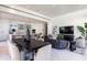 Open concept living space with dining area and modern seating arrangements at 6587 N Palmeraie Blvd # 2041, Paradise Valley, AZ 85253