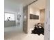 Modern interior with a sliding door, marble floors, and elegant decor creating a bright, open atmosphere at 6587 N Palmeraie Blvd # 2041, Paradise Valley, AZ 85253