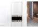 Stainless steel Wolf oven built into white cabinetry at 6587 N Palmeraie Blvd # 2041, Paradise Valley, AZ 85253