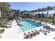Luxurious pool area with lounge chairs and palm trees at 6587 N Palmeraie Blvd # 2041, Paradise Valley, AZ 85253