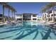Luxury pool with lounge chairs and palm trees at The Ritz-Carlton Residences, Paradise Valley at 6587 N Palmeraie Blvd # 2041, Paradise Valley, AZ 85253