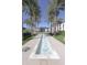 Beautiful walkway featuring an attractive water feature and palm trees at 6587 N Palmeraie Blvd # 2041, Paradise Valley, AZ 85253