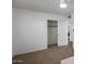 Clean bedroom with ceiling fan and closet at 7327 N 21St Ave, Phoenix, AZ 85021