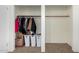 Spacious closet with ample hanging space, shelves and room for storage boxes and laundry baskets at 7327 N 21St Ave, Phoenix, AZ 85021