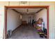 Spacious garage interior with ample room for storage and parking, natural lighting, and access door at 7327 N 21St Ave, Phoenix, AZ 85021