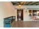 Charming front porch with decorative bench, tile flooring, and warm lighting fixtures at 7451 E Long Rifle Rd, Carefree, AZ 85377