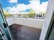 Outdoor balcony shows neighborhood view with blue skies and mature trees at 7667 E Krall St, Scottsdale, AZ 85250
