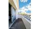 Relaxing balcony with sliding door provides an outdoor retreat and neighborhood views at 7667 E Krall St, Scottsdale, AZ 85250