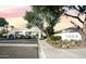 Community entrance with desert landscaping and a grand gated entrance to 7600 Lincoln at 7667 E Krall St, Scottsdale, AZ 85250
