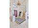 Inviting foyer featuring a staircase, chandelier, and plenty of natural light at 7667 E Krall St, Scottsdale, AZ 85250